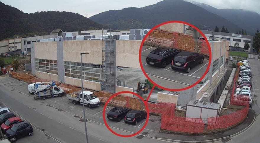 data blurring construction site
: two black cars with blurred license plates